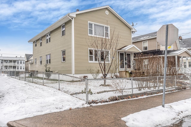 view of snow covered property