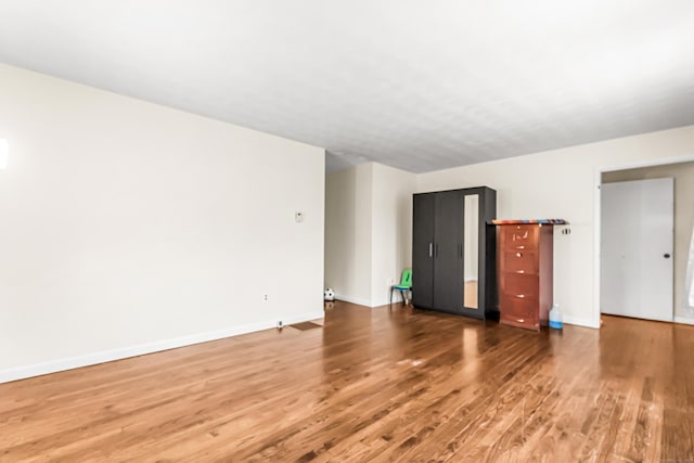 interior space with hardwood / wood-style floors