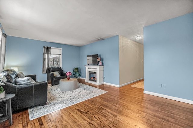 living room featuring hardwood / wood-style floors