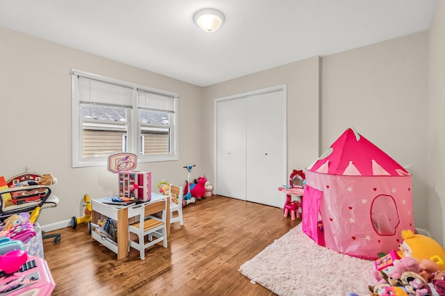 playroom featuring hardwood / wood-style floors