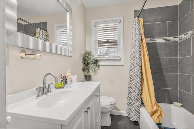 full bathroom with vanity, toilet, and shower / bath combo