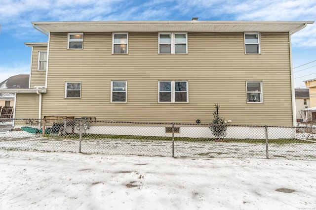 view of snow covered house