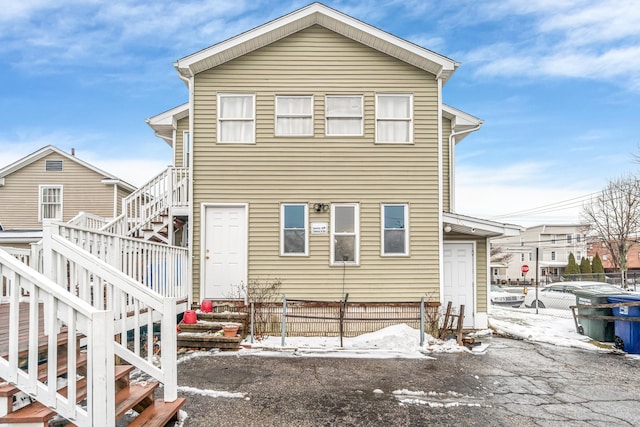 view of snow covered house