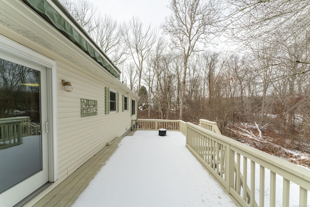 view of snow covered deck