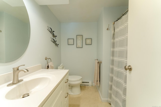 bathroom with vanity, toilet, and a baseboard heating unit