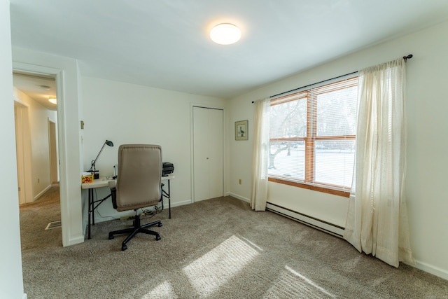 carpeted office with baseboard heating