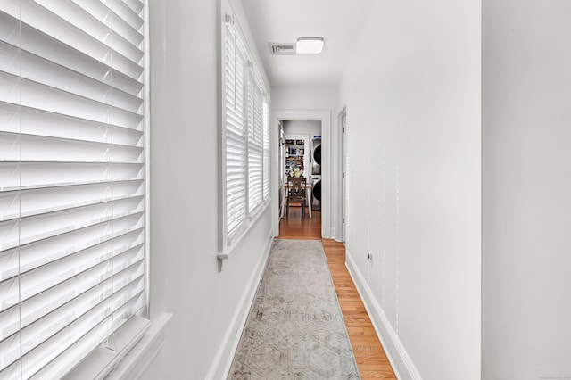 corridor featuring hardwood / wood-style floors