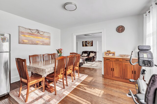 dining room with light hardwood / wood-style flooring