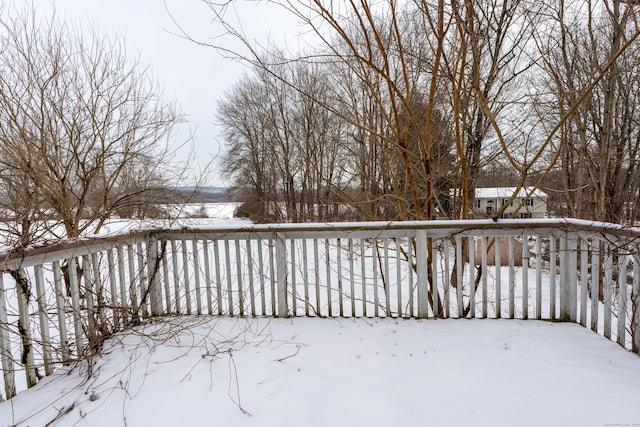 view of snow covered deck