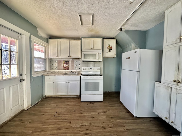 kitchen featuring white cabinetry, white appliances, and dark wood-type flooring