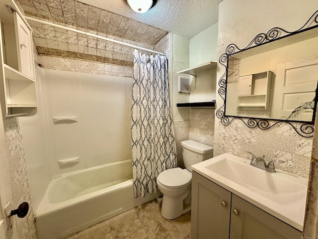 full bathroom featuring toilet, a textured ceiling, tile walls, vanity, and shower / bath combination with curtain