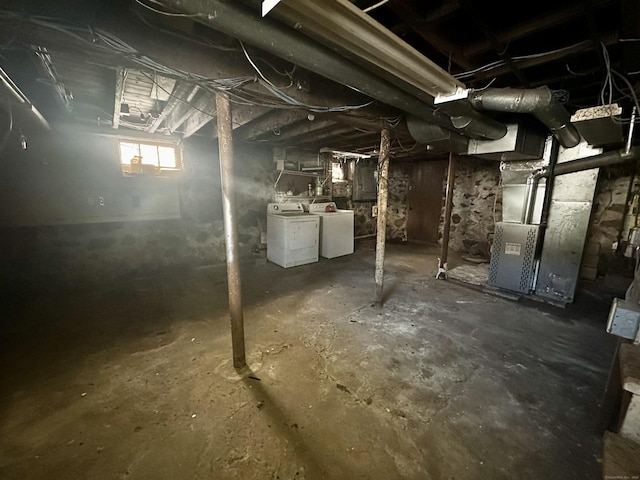 basement with washing machine and dryer