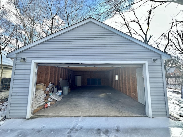 view of snow covered garage