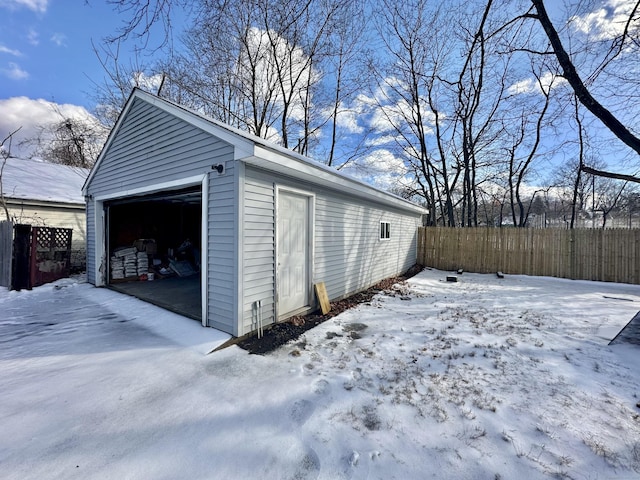 view of snow covered garage