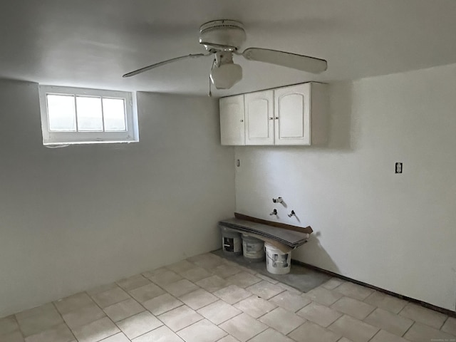 basement featuring ceiling fan