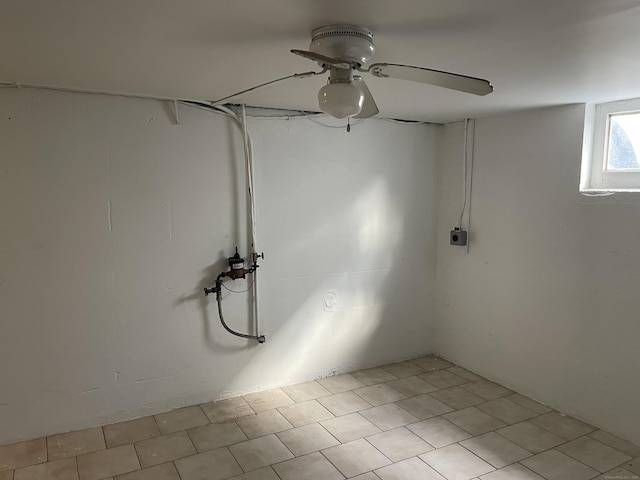 basement featuring ceiling fan