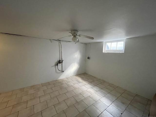 basement featuring ceiling fan