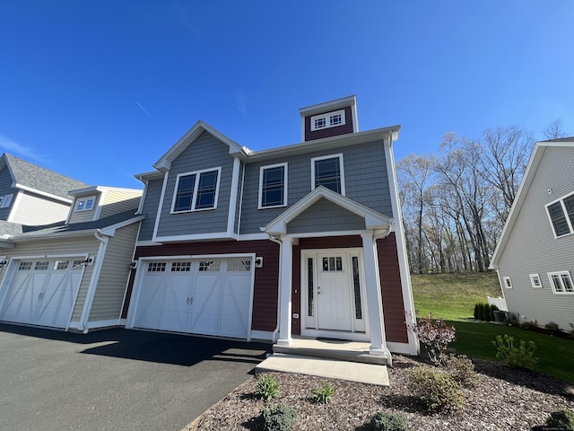 view of front of property featuring a garage