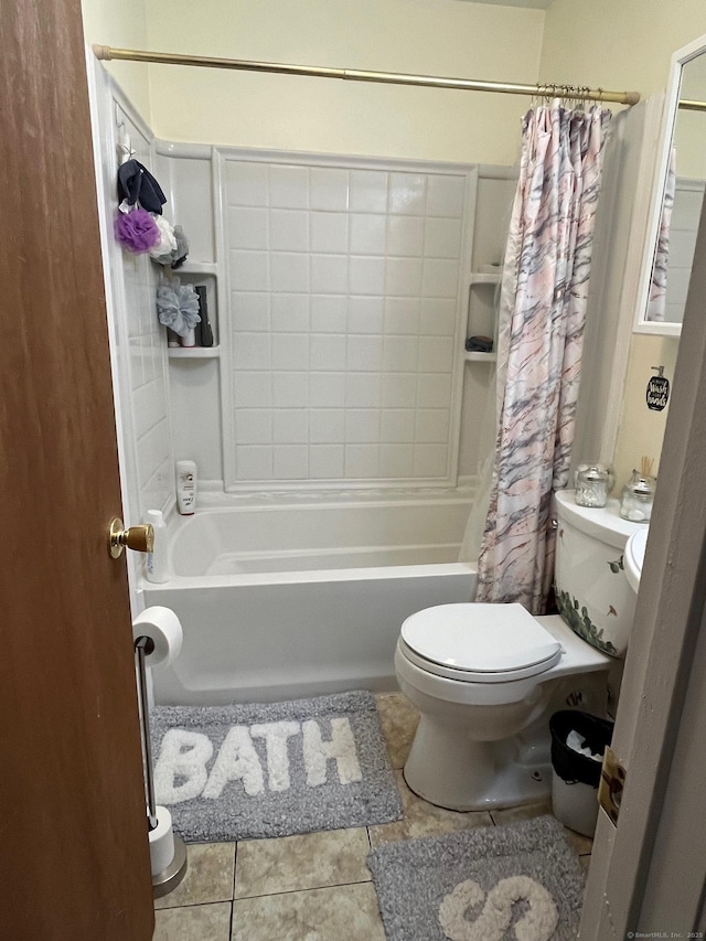 bathroom with tile patterned flooring, shower / bath combo, and toilet