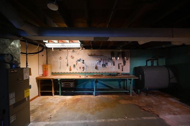 basement with a workshop area