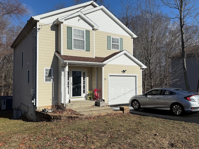 view of front facade featuring a garage, a front lawn, and central air condition unit