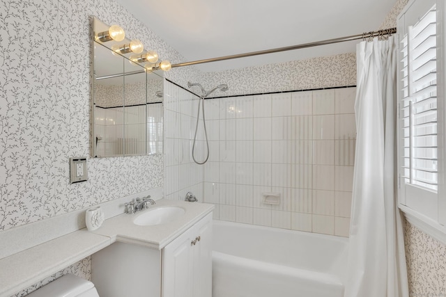 full bathroom featuring vanity, toilet, and shower / bath combo