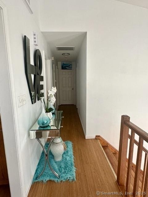 hallway featuring hardwood / wood-style floors