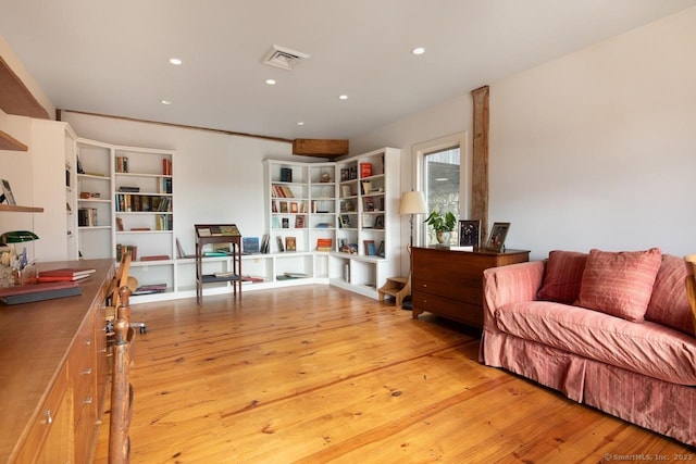 sitting room featuring light hardwood / wood-style floors