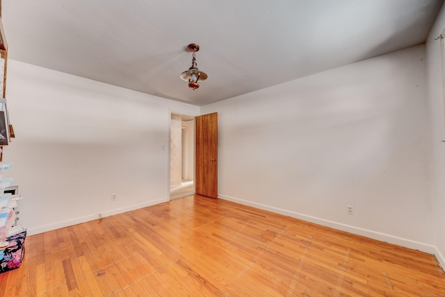 unfurnished room featuring light hardwood / wood-style flooring