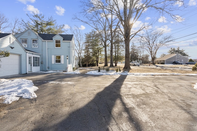 view of home's exterior with a garage