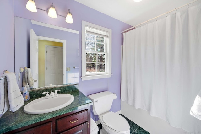 full bathroom featuring vanity, shower / bath combination with curtain, and toilet