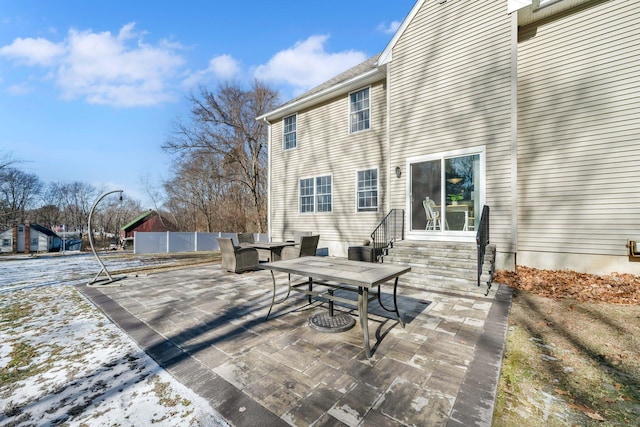 view of snow covered patio