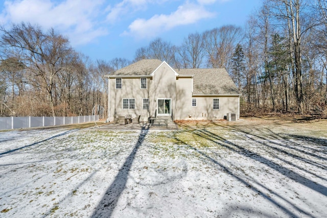 view of snow covered property