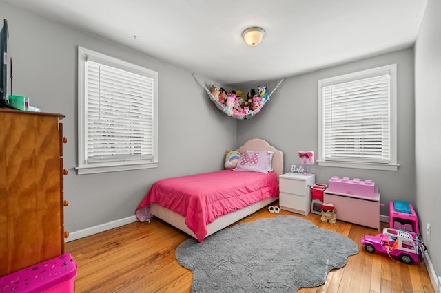 bedroom featuring light wood-type flooring