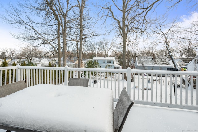 view of snow covered deck