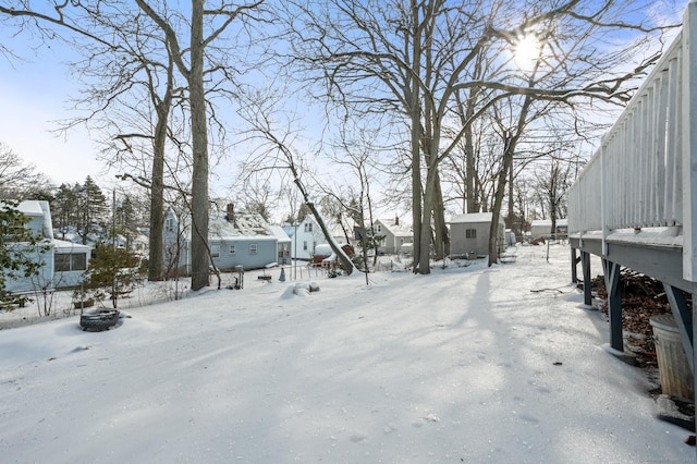 view of yard covered in snow