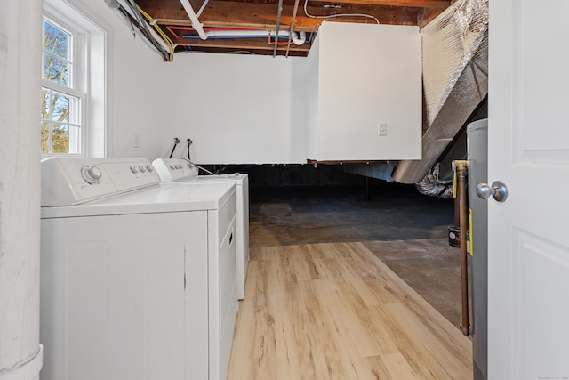 laundry room featuring washing machine and clothes dryer