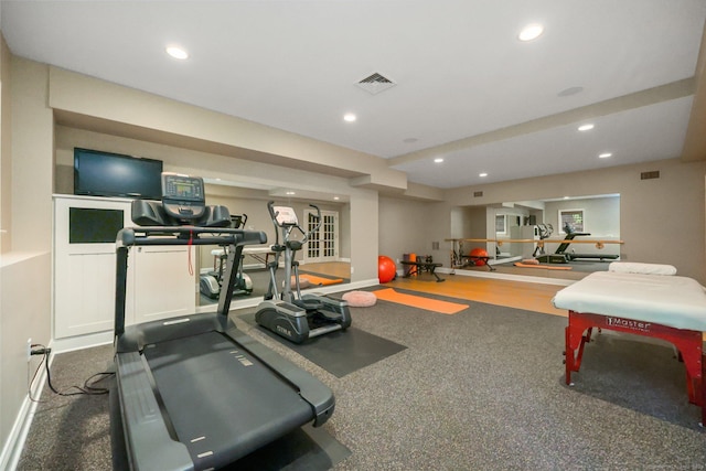 workout area with visible vents and recessed lighting