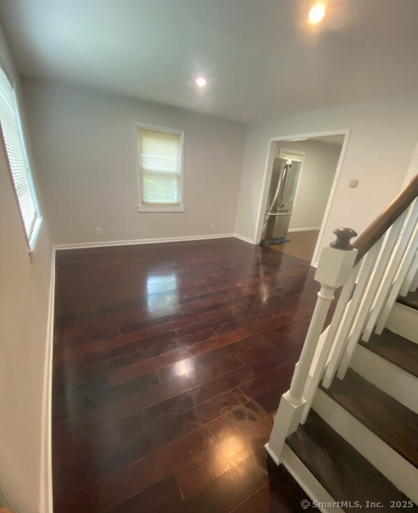 interior space with hardwood / wood-style floors and a wealth of natural light