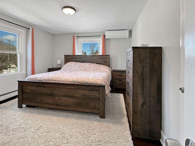 carpeted bedroom with a baseboard radiator, multiple windows, and an AC wall unit