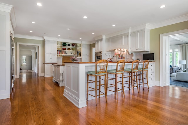 109 Elys Ferry Rd, Lyme, CT 06371 - kitchen with open shelves, white cabinets, stainless steel oven, a peninsula, and recessed lighting
