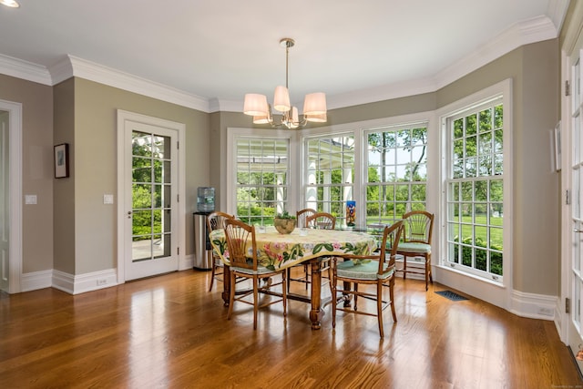 109 Elys Ferry Rd, Lyme, CT 06371 - dining space featuring a chandelier, wood finished floors, and ornamental molding