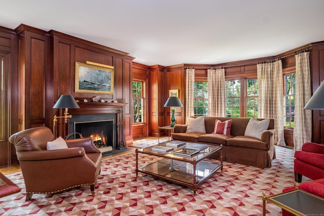 109 Elys Ferry Rd, Lyme, CT 06371 - living room with a warm lit fireplace and wooden walls