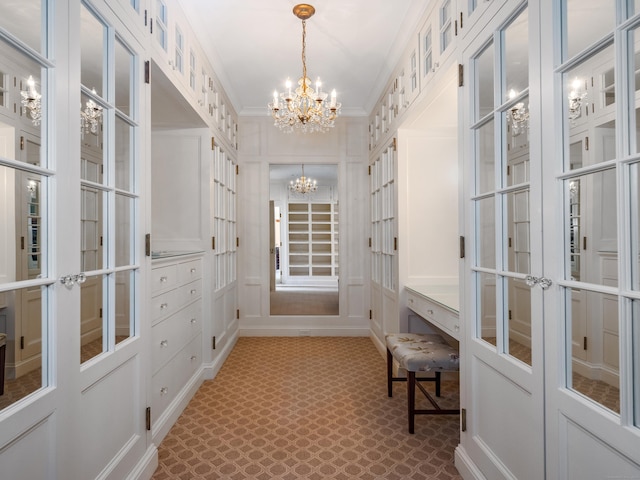 109 Elys Ferry Rd, Lyme, CT 06371 - walk in closet featuring a chandelier and french doors