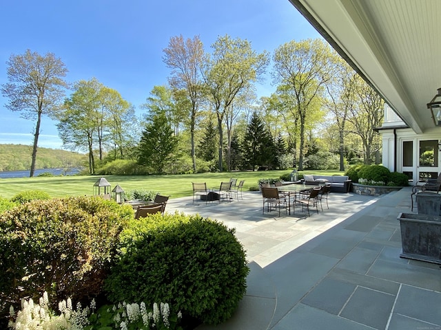 109 Elys Ferry Rd, Lyme, CT 06371 - view of patio / terrace with an outdoor living space with a fire pit