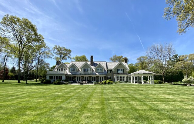 109 Elys Ferry Rd, Lyme, CT 06371 - back of property featuring a yard and a chimney