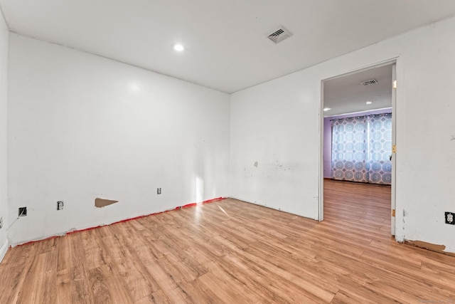 empty room with light wood-type flooring