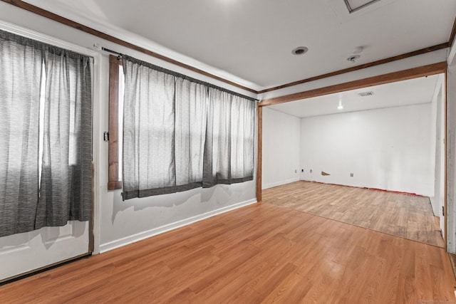 unfurnished room with hardwood / wood-style floors