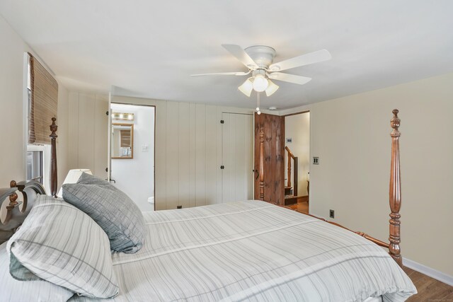 bedroom with wood-type flooring and ceiling fan