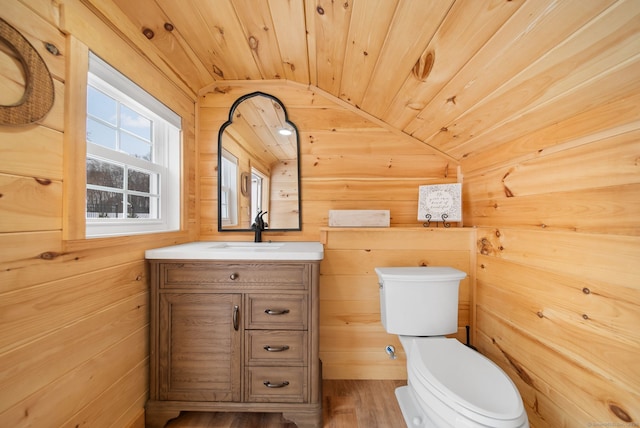 half bath with lofted ceiling, wooden ceiling, toilet, vanity, and wood walls